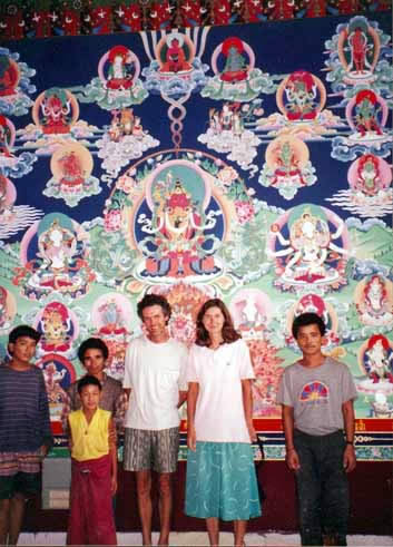 Rinpoche's assistant with his wife and the artist in front of Amitayu mandala